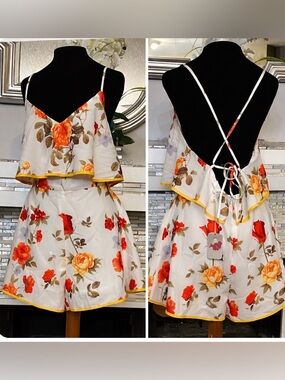 NWT L’atiste women’s floral romper with crisscross back size L